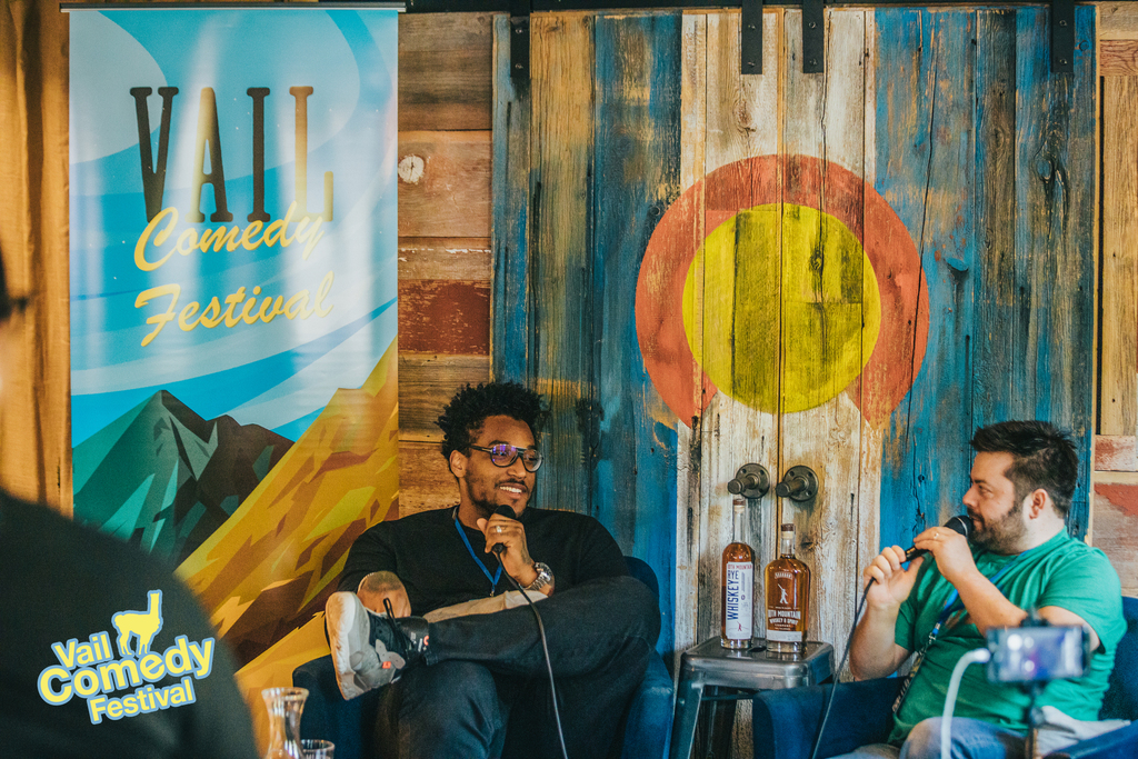 A live podcast taping at 10th Mountain Whiskey in Vail, CO during the 2022 Vail Comedy Festival.